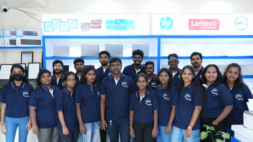 Bethel Computech team members posing in the showroom, showcasing the company's skilled workforce, customer service excellence, and expertise in refurbished laptops, IT solutions, and computer support services.